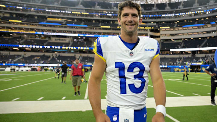Aug 9, 2025; Inglewood, California, USA;  Los Angeles Rams quarterback Stetson Bennett IV (13) leaves the field after the game against the Dallas Cowboys at SoFi Stadium. Mandatory Credit: Jayne Kamin-Oncea-Imagn Images