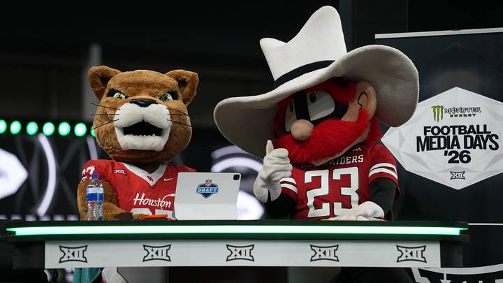 Jul 8, 2026; Frisco, TX, USA; Houston Cougar mascot “Shasta” and Texas Tech’s “Red Raider” on the ESPN set during Big 12 Conference Football Media Days at The Star. Mandatory Credit: Raymond Carlin III-Imagn Images Jul 8, 2026; Frisco, TX, USA; Houston Cougar mascot “Shasta” and Texas Tech’s “Red Raider” on the ESPN set during Big 12 Conference Football Media Days at The Star. Mandatory Credit: Raymond Carlin III-Imagn Images