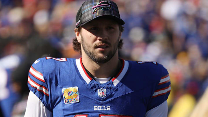 Bills quarterback Josh Allen watches his team go for the extra point during first half action at Highmark Stadium in Orchard Park.