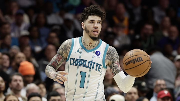 Mar 28, 2026; Charlotte, North Carolina, USA; Charlotte Hornets guard LaMelo Ball (1) dribbles the ball up the court during the fourth quarter against the Philadelphia 76ers at Spectrum Center. Mandatory Credit: Brian Westerholt-Imagn Images