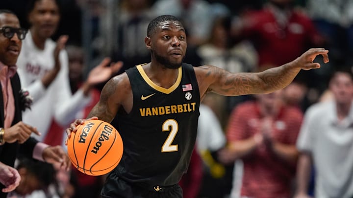 Vanderbilt guard Duke Miles (2) looks for and outlet during the first half of the SEC tournament championship game against Arkansas at Bridgestone Arena in Nashville, Tenn., Sunday, March 15, 2026.