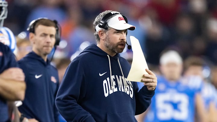 Jan 8, 2026; Glendale, AZ, USA; Mississippi Rebels head coach Pete Golding against the Miami Hurricanes during the 2026 Fiesta Bowl and semifinal game of the College Football Playoff at State Farm Stadium. Mandatory Credit: Mark J. Rebilas-Imagn Images Jan 8, 2026; Glendale, AZ, USA; Mississippi Rebels head coach Pete Golding against the Miami Hurricanes during the 2026 Fiesta Bowl and semifinal game of the College Football Playoff at State Farm Stadium. Mandatory Credit: Mark J. Rebilas-Imagn Images