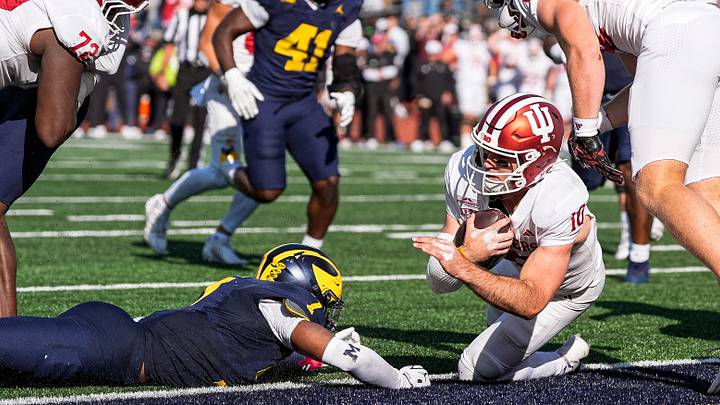 Indiana quarterback Josh Hoover (10) runs for a touchdown against Michigan during overtime at Michigan Stadium in Ann Arbor on Saturday, Oct. 24, 2026.