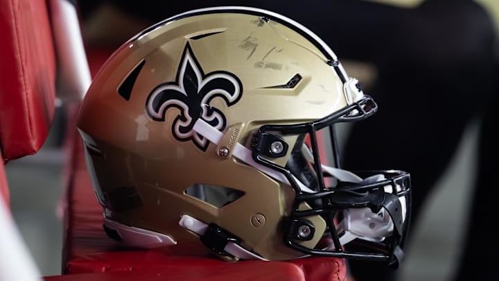 Aug 10, 2024; Glendale, Arizona, USA; Detailed view of a New Orleans Saints helmet during a preseason NFL game at State Farm Stadium. Mandatory Credit: Mark J. Rebilas-Imagn Images