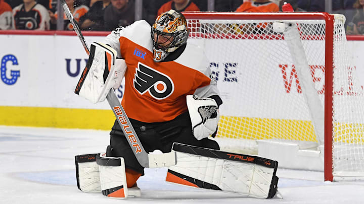 Oct 22, 2024; Philadelphia, Pennsylvania, USA; Philadelphia Flyers goaltender Samuel Ersson (33) makes a save against the Washington Capitals during the first period at Wells Fargo Center. Mandatory Credit: Eric Hartline-Imagn Images