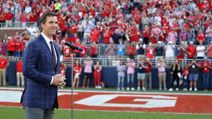 Oct 23, 2021; Oxford, Mississippi, USA; Mississippi Rebels former quarterback Eli Manning speaks on what an honor it is to have his number 10 jersey retired at Mississippi during half time at Vaught-Hemingway Stadium. Mandatory Credit: Petre Thomas-Imagn Images Oct 23, 2021; Oxford, Mississippi, USA; Mississippi Rebels former quarterback Eli Manning speaks on what an honor it is to have his number 10 jersey retired at Mississippi during half time at Vaught-Hemingway Stadium. Mandatory Credit: Petre Thomas-Imagn Images