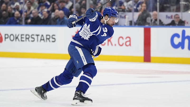 Dec 12, 2024; Toronto, Ontario, CAN; Toronto Maple Leafs forward Auston Matthews (34) shoots the puck against the Anaheim Ducks during the third period at Scotiabank Arena. Mandatory Credit: John E. Sokolowski-Imagn Images Dec 12, 2024; Toronto, Ontario, CAN; Toronto Maple Leafs forward Auston Matthews (34) shoots the puck against the Anaheim Ducks during the third period at Scotiabank Arena. Mandatory Credit: John E. Sokolowski-Imagn Images