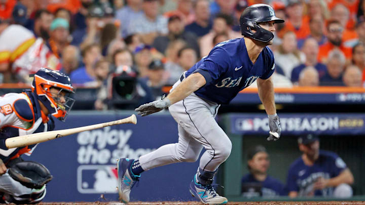 Seattle Mariners second baseman Adam Frazier hits a single during an American League Divisional Series game against the Houston Astros on Oct. 11, 2022, at Minute Maid Park.