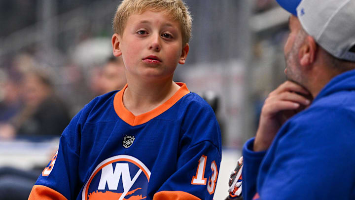 Oct 26, 2024; Elmont, New York, USA;  New York Islanders fan reacts after the loss against the Florida Panthers at UBS Arena. Mandatory Credit: Dennis Schneidler-Imagn Images