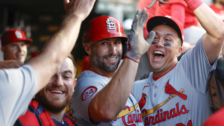 Aug 1, 2024; Chicago, Illinois, USA; St. Louis Cardinals first baseman Paul Goldschmidt (46) celebrates with teammates in the dugout after hitting a solo home run against the Chicago Cubs during the first inning at Wrigley Field. Mandatory Credit: Kamil Krzaczynski-Imagn Images