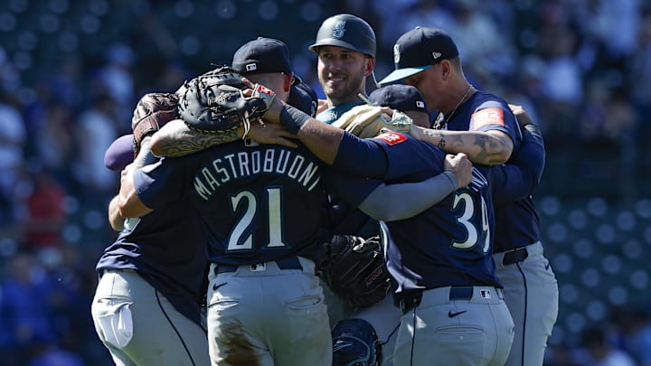 Seattle Mariners players celebrate after a 14-6 win against the Chicago Cubs on June 22 at Wrigley Field.