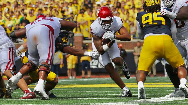 Oklahoma running back Xavier Robinson rushes against Michigan. Oklahoma running back Xavier Robinson rushes against Michigan.