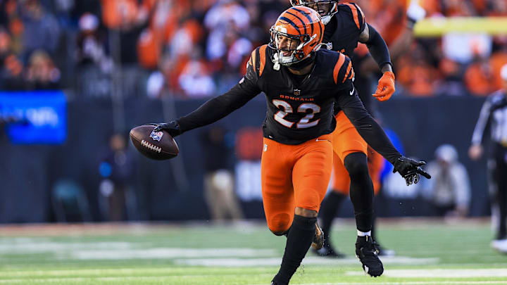 Dec 22, 2024; Cincinnati, Ohio, USA; Cincinnati Bengals safety Geno Stone (22) reacts after intercepting a pass against the Cleveland Browns in the second half at Paycor Stadium. Mandatory Credit: Katie Stratman-Imagn Images