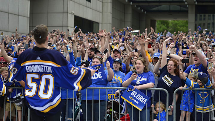Jun 15, 2019; St. Louis, MO, USA; St. Louis Blues goaltender Jordan Binnington (50) celebrates with fans during the Stanley Cup championship parade and rally at the Gateway Arch. Mandatory Credit: Jeff Curry-Imagn Images