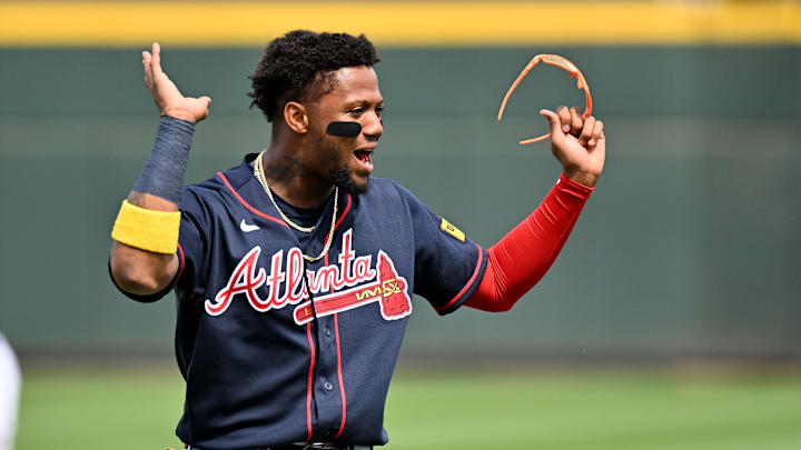 Atlanta Braves right fielder Ronald Acuna Jr. (13) warms up before the start of the game against the Boston Red Sox during spring training at CoolToday Park. 