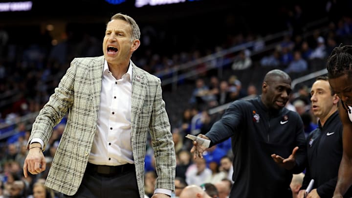 Mar 27, 2025; Newark, NJ, USA; Alabama Crimson Tide head coach Nate Oats reacts during the first half against the Brigham Young Cougars during an East Regional semifinal of the 2025 NCAA tournament at Prudential Center. Mandatory Credit: Vincent Carchietta-Imagn Images Mar 27, 2025; Newark, NJ, USA; Alabama Crimson Tide head coach Nate Oats reacts during the first half against the Brigham Young Cougars during an East Regional semifinal of the 2025 NCAA tournament at Prudential Center. Mandatory Credit: Vincent Carchietta-Imagn Images