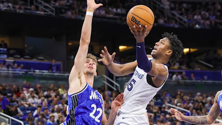 Memphis Grizzlies forward GG Jackson (45) drives to the basket against Orlando Magic forward Franz Wagner (22) during the second half at KIA Center.
