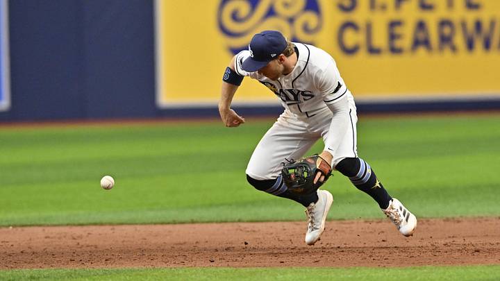 May 31, 2026; St. Petersburg, Florida, USA; Tampa Bay Rays short stop Taylor Walls (6) drops the ball during the eighth inning against Los Angeles Angels at Tropicana Field. 