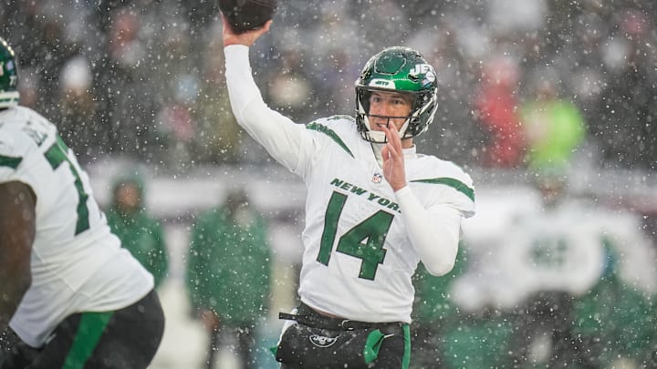 Jan 7, 2024; Foxborough, Massachusetts, USA; New York Jets quarterback Trevor Siemian (14) throws a pass against the New England Patriots in the second half at Gillette Stadium. Mandatory Credit: David Butler II-Imagn Images