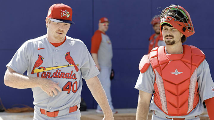 Feb 16, 2026; Jupiter, FL, USA;  St. Louis Cardinals catcher prospect Grayson Tarlow (right) walks with pitcher Hunter Dobbins (40) during spring training workouts at Roger Dean Stadium. Mandatory Credit: Reinhold Matay-Imagn Images