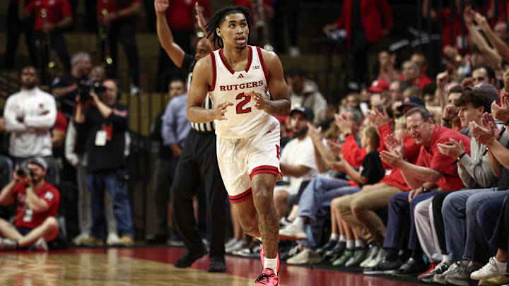 Nov 6, 2024; Piscataway, New Jersey, USA; Rutgers Scarlet Knights guard Dylan Harper (2) reacts after making a three point basket during the first half against the Wagner Seahawks at Jersey Mike's Arena. Mandatory Credit: Vincent Carchietta-Imagn Images
