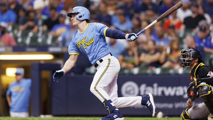 Milwaukee Brewers designated hitter Mark Canha (21)