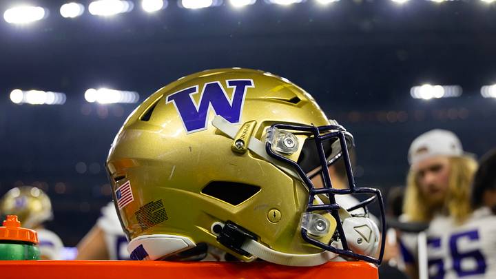 The Husky helmet sits prominently on the sideline during the 2024 CFP national championship game. The Husky helmet sits prominently on the sideline during the 2024 CFP national championship game.