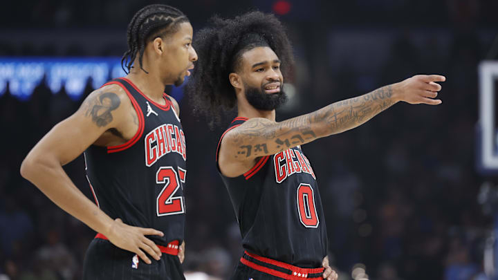 Mar 31, 2025; Oklahoma City, Oklahoma, USA; Chicago Bulls guard Coby White (0) talks to forward Dalen Terry (25) during the first quarter against the Oklahoma City Thunder at Paycom Center. Mandatory Credit: Alonzo Adams-Imagn Images