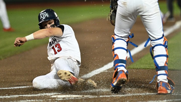 Jun 15, 2024; Omaha, NE, USA;  Texas A&M Aggies left fielder Caden Sorrell (13) scores against the Texas A&M Aggies during the second inning at Charles Schwab Field Omaha. Mandatory Credit: Steven Branscombe-Imagn Images
