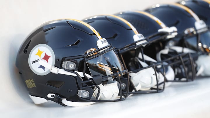 Oct 6, 2024; Pittsburgh, Pennsylvania, USA; Pittsburgh Steelers helmets on the bench before a game against the Dallas Cowboys at Acrisure Stadium. Mandatory Credit: Charles LeClaire-Imagn Images