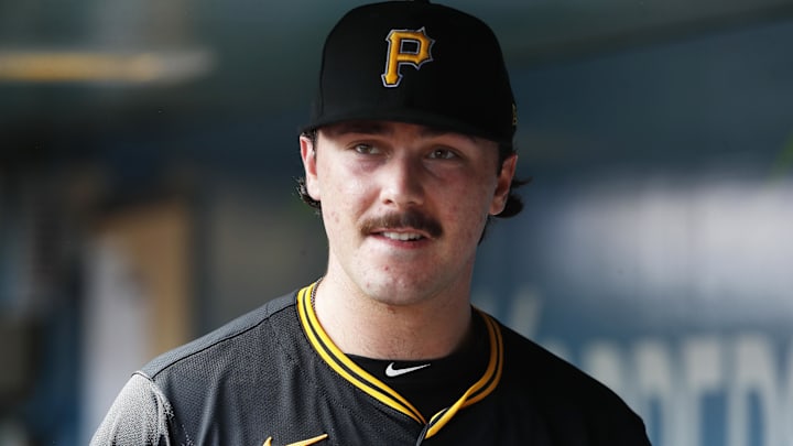Pittsburgh Pirates starting pitcher Paul Skenes (30) looks on from the dugout against the Chicago Cubs. Pittsburgh Pirates starting pitcher Paul Skenes (30) looks on from the dugout against the Chicago Cubs.