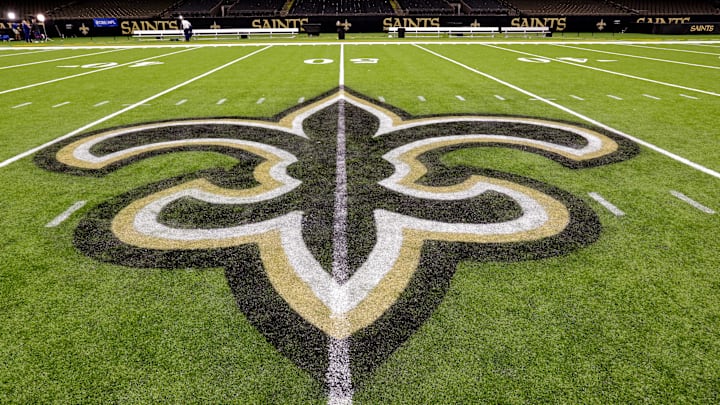 Oct 30, 2022; New Orleans, Louisiana, USA;  General view of the New Orleans Saints logo as the midfield logo fleur-de-lis after the game between the New Orleans Saints and the Las Vegas Raiders at Caesars Superdome. Mandatory Credit: Stephen Lew-Imagn Images
