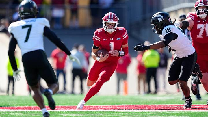 Oct 3, 2026; Madison, Wisconsin, USA;  Wisconsin Badgers quarterback Colton Joseph (1) rushes with the football during the second quarter against the Michigan State Spartans at Camp Randall Stadium. Mandatory Credit: Jeff Hanisch-Imagn Images
