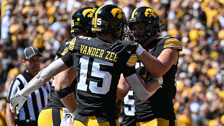 Aug 31, 2024; Iowa City, Iowa, USA; Iowa Hawkeyes wide receiver Reece Vander Zee (15) and tight end Luke Lachey (85) react after a touchdown by Vander Zee during the fourth quarter against the Illinois State Redbirds at Kinnick Stadium. Mandatory Credit: Jeffrey Becker-Imagn Images
