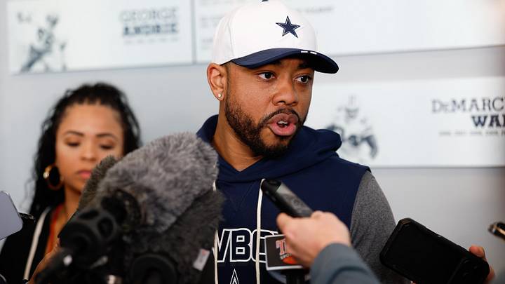 Dallas Cowboys defensive coordinator Christian Parker is interviewed after practice at the Ford Center. Dallas Cowboys defensive coordinator Christian Parker is interviewed after practice at the Ford Center.