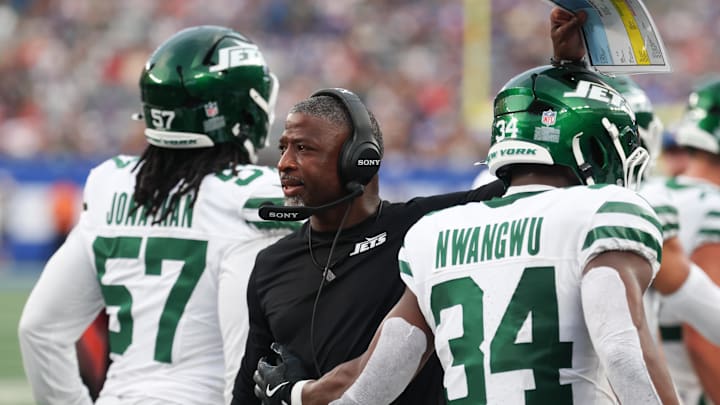 Aug 16, 2025; East Rutherford, New Jersey, USA; New York Jets head coach Aaron Glenn with running back Kene Nwangwu (34) during the first quarter against the New York Giants at MetLife Stadium. Mandatory Credit: Vincent Carchietta-Imagn Images