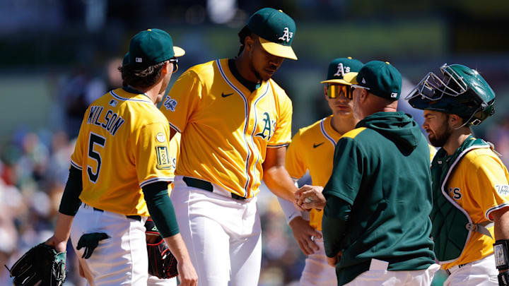 Apr 2, 2025; West Sacramento, California, USA; Athletics pitcher Angel Perdomo (52) is removed from the game during the seventh inning against the Chicago Cubs at Sutter Health Park. Mandatory Credit: Sergio Estrada-Imagn Images Apr 2, 2025; West Sacramento, California, USA; Athletics pitcher Angel Perdomo (52) is removed from the game during the seventh inning against the Chicago Cubs at Sutter Health Park. Mandatory Credit: Sergio Estrada-Imagn Images