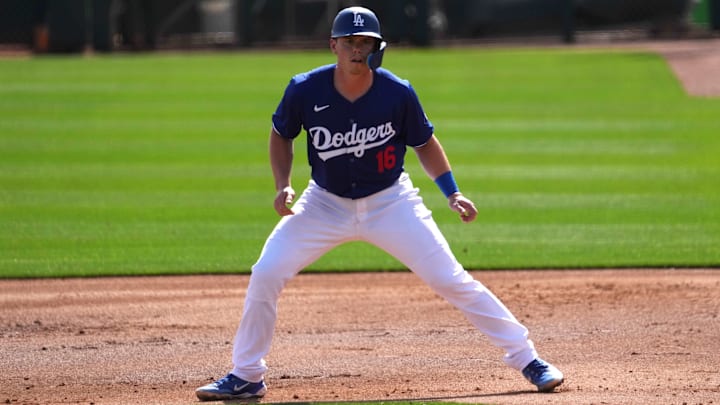 Feb 25, 2024; Phoenix, Arizona, USA; Los Angeles Dodgers catcher Will Smith (16) leads off first