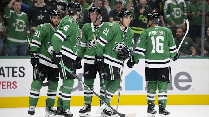 Oct 3, 2023; Dallas, Texas, USA; Dallas Stars defenseman Lian Bichsel (6) and left wing Jason Robertson (21) and center Joe Pavelski (16) and center Tyler Seguin (91) and defenseman Thomas Harley (55) celebrates a goal scored by Robertson against the Colorado Avalanche during the second period at the American Airlines Center. Mandatory Credit: Jerome Miron-Imagn Images