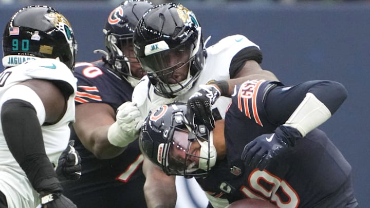 Oct 13, 2024; London, United Kingdom; Chicago Bears quarterback Caleb Williams (18) is tackled by Jacksonville Jaguars defensive end Josh Hines-Allen (41) in the second half during an NFL International Series game at Tottenham Hotspur Stadium. Mandatory Credit: Kirby Lee-Imagn Images Oct 13, 2024; London, United Kingdom; Chicago Bears quarterback Caleb Williams (18) is tackled by Jacksonville Jaguars defensive end Josh Hines-Allen (41) in the second half during an NFL International Series game at Tottenham Hotspur Stadium. Mandatory Credit: Kirby Lee-Imagn Images