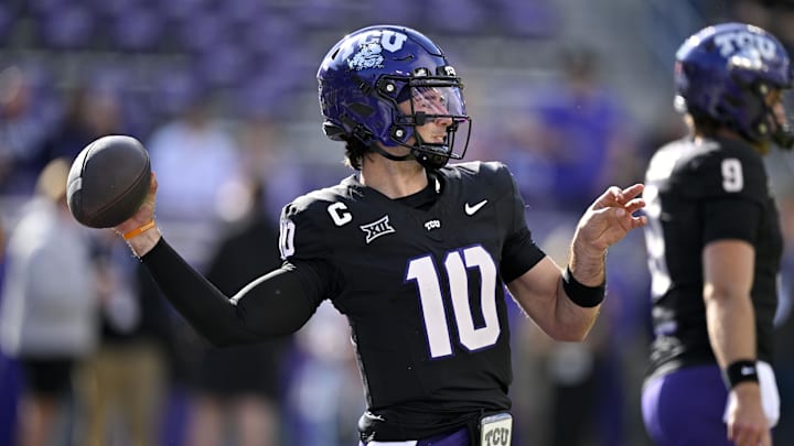 Nov 29, 2025; Fort Worth, Texas, USA; TCU Horned Frogs quarterback Josh Hoover (10) warms up before the game against the Cincinnati Bearcats at Amon G. Carter Stadium. Mandatory Credit: Jerome Miron-Imagn Images