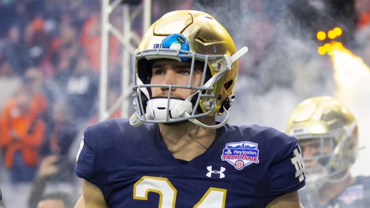 Jan 1, 2022; Glendale, Arizona, USA; Notre Dame Fighting Irish linebacker Jack Kiser (24) against the Oklahoma State Cowboys in the 2022 Fiesta Bowl at State Farm Stadium.