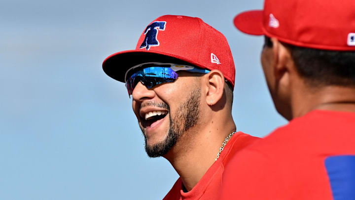 Feb 12, 2025; Clearwater, FL, USA; Philadelphia Phillies pitcher Jose Ruiz (66) talks with his teammates during a spring training workout at Carpenter Complex. Feb 12, 2025; Clearwater, FL, USA; Philadelphia Phillies pitcher Jose Ruiz (66) talks with his teammates during a spring training workout at Carpenter Complex.