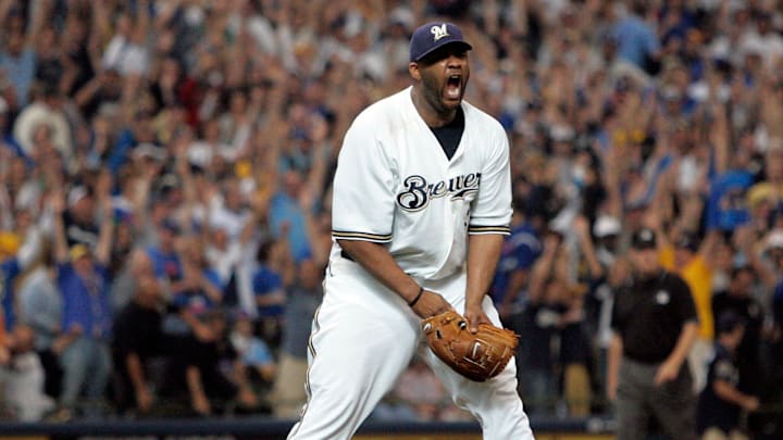 Milwaukee Brewers' CC Sabathia reacts after the final out was made clinching a wild card spot for