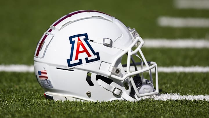 Nov 25, 2022; Tucson, Arizona, USA; Detailed view of an Arizona Wildcats helmet on the field during the Territorial Cup at Arizona Stadium. Mandatory Credit: Mark J. Rebilas-Imagn Images