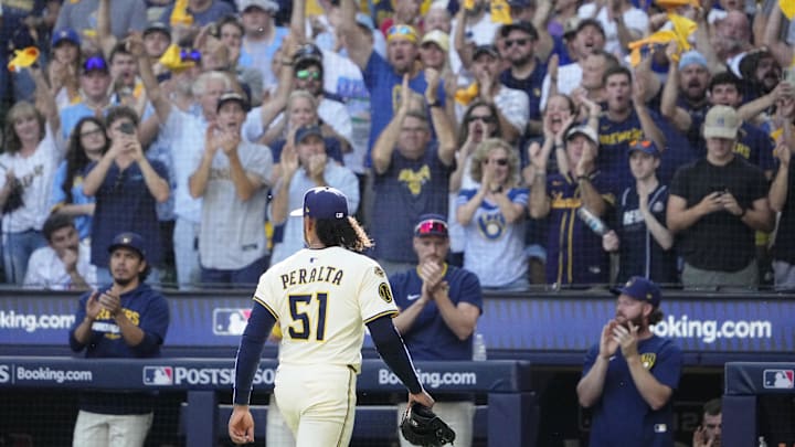 Oct 4, 2025; Milwaukee, Wisconsin, USA; Milwaukee Brewers starting pitcher Freddy Peralta (51) exits the game against the Chicago Cubs during the sixth inning of game one of the NLDS round for the 2025 MLB playoffs at American Family Field. Mandatory Credit: Michael McLoone-Imagn Images Oct 4, 2025; Milwaukee, Wisconsin, USA; Milwaukee Brewers starting pitcher Freddy Peralta (51) exits the game against the Chicago Cubs during the sixth inning of game one of the NLDS round for the 2025 MLB playoffs at American Family Field. Mandatory Credit: Michael McLoone-Imagn Images