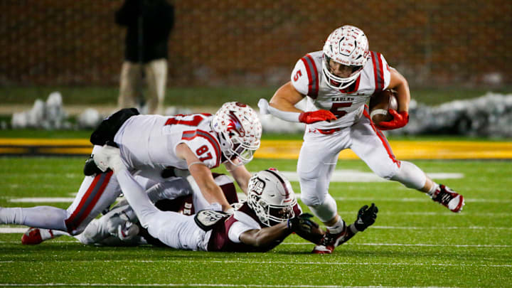 Nixa's Dylan Rebura carries the ball as the Eagles took on the De Smet Spartans in the Class 6 State Championship game at Faurot Field in Columbia, Mo. on Friday, Dec. 6, 2024.