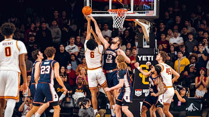 Illinois center Tomislav Ivisic blocks an attempt from USC forward Jacob Cofie (6) in the Illini's 101-65 win over the Trojans on Wednesday at the Galen Center in Los Angeles.