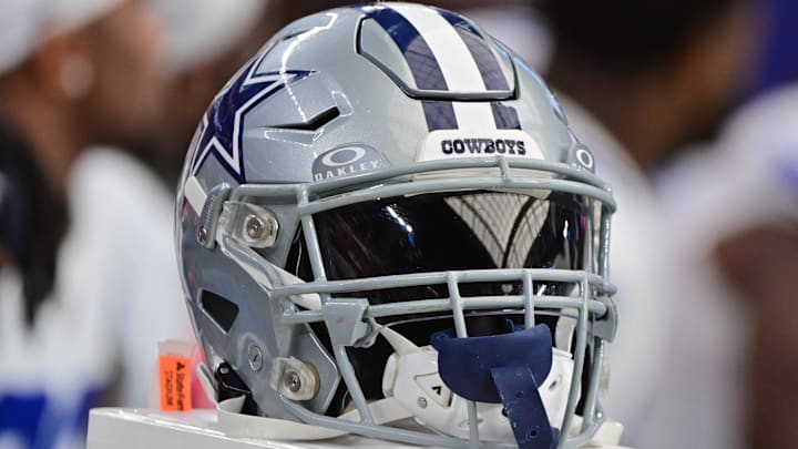 Detail view of a Dallas Cowboys helmet.