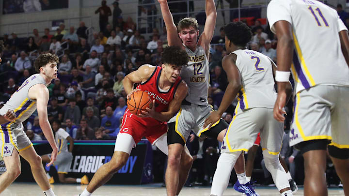 Cameron Boozer of the Miami Columbus High School basketball team drives to the basket during the championship game against Montverde at the City of Palms Classic at Suncoast Credit Union Arena in Fort Myers on Monday, Dec. 23, 2024.